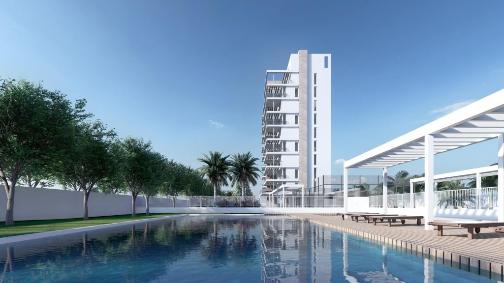 05-VIVIENDA-VACACIONAL-REBEL-CAPYBARA Renderizado 3D exterior de un edificio de apartamentos vacacional con piscina y palmeras. Por Rebel Capybara Studio.